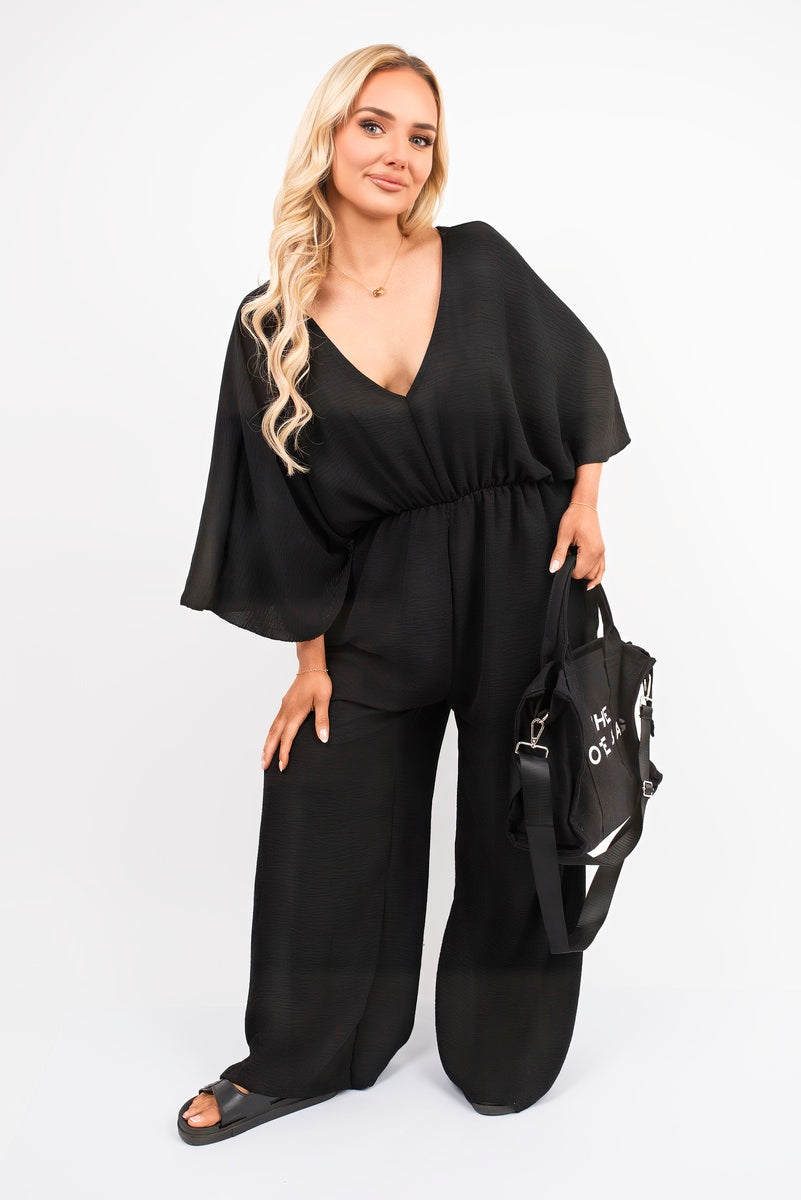 Wide Leg V Neck Jumpsuit with Back Tie Detail